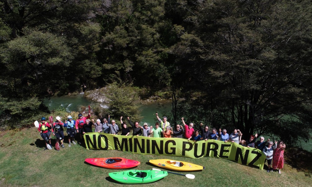 No Mining Pure NZ banner held by protesters in Mt Richmond Forest Park, Nelson on 30 Oct 2022