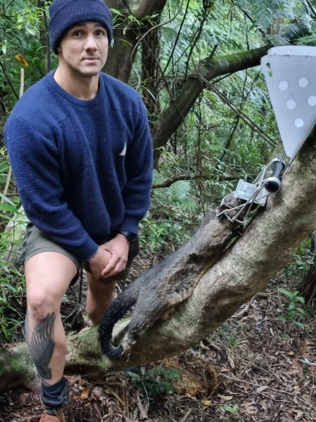 Darren van der Hoof, Regional Conservation Manager, checking traps in his regions