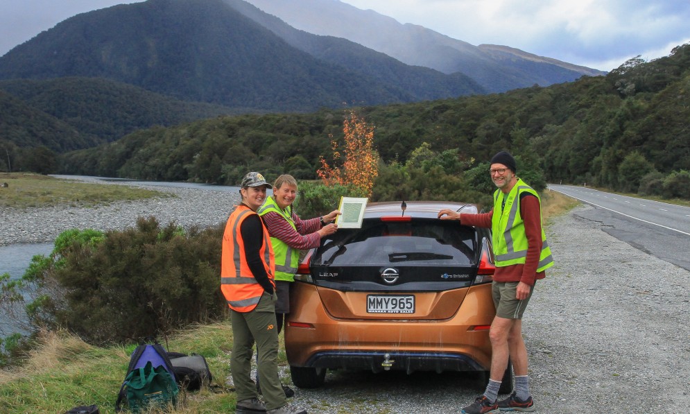 Forest & Bird trappers Jessie Scurr, Jane Forsyth, and Stuart Palmer travel to Makarora in electric vehicles when they can. Image Mo Turnbull